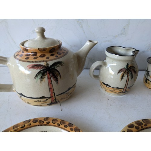 415 - A Set Of Dedza African Themed Crockery Including Teapot, Cups, Saucers, Jug And Sugar Bowl