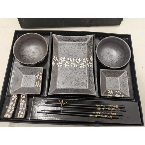 449 - An Oriental Stone Dinner Set With Chopsticks