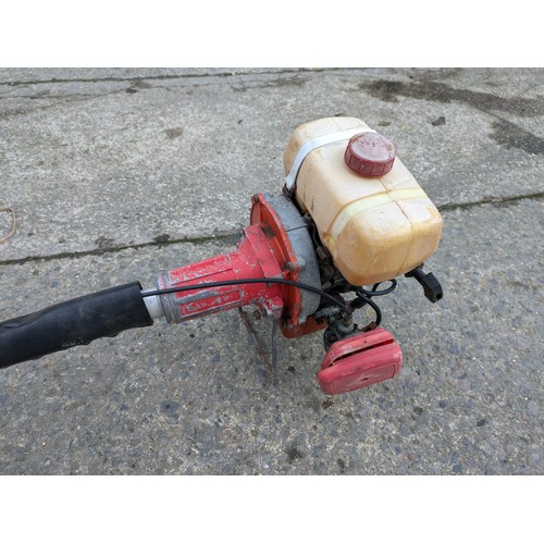 74 - A Vintage Petrol Strimmer