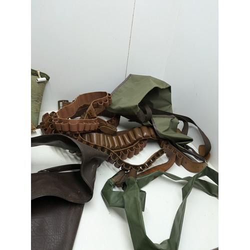 166 - A Large Selection Of Leather Gun Ammunition Belts And Equipment