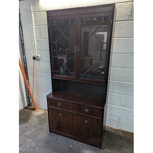 607 - A 2 Piece Display Cabinet With Drawers