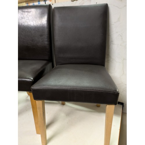 608 - A Set Of 3 Faux Leather Dining Chairs