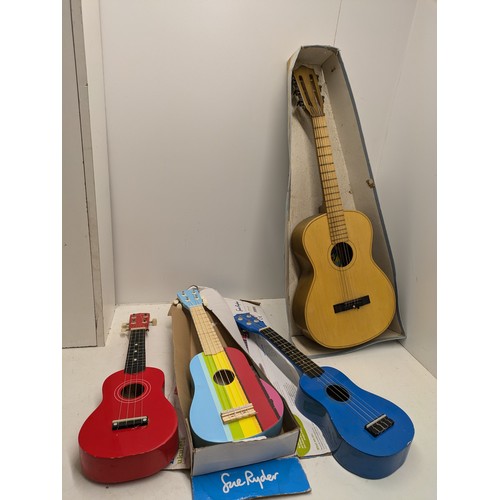 550 - A Selection Of 3 Ukuleles And A Children's Acoustic Guitar