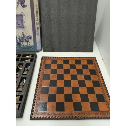 486 - A Chess Board With A Set Of The Chessmen Pieces