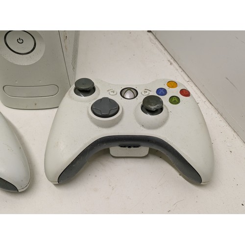 272 - An Original Xbox 360 Console With Controller, Cables And Games