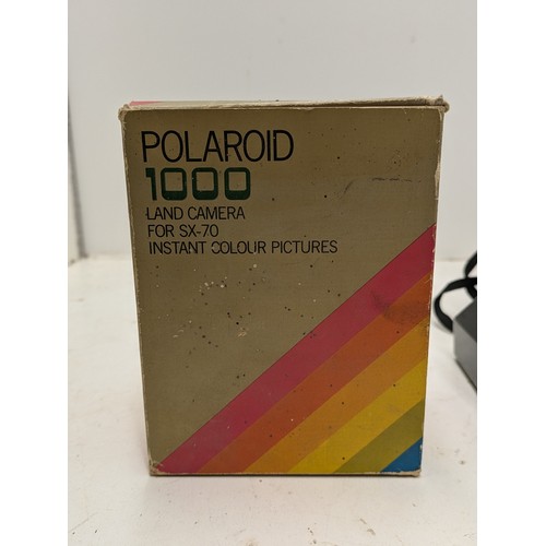 216 - Polaroid 1000 Land Camera In Its Original Box And A Kodak Film Camera