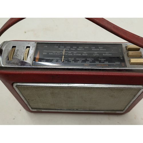 219 - A Vintage Bush Tr130 Portable Radio In Red