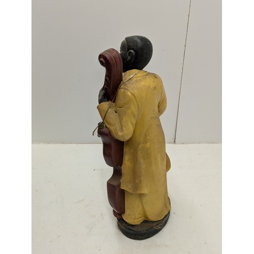 162 - A Vintage Ceramic Black Cello Player Figure