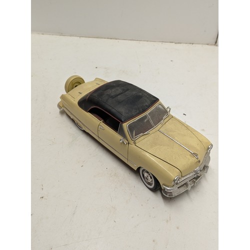 469 - A Maisto 1950 Ford 1/18 Scale Die Cast Car