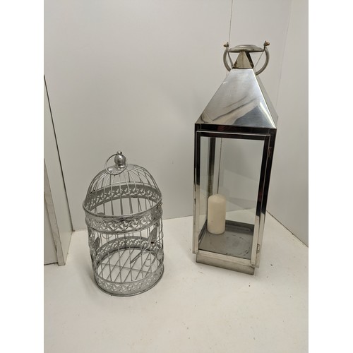 533 - A Large Glass Candle Holder And A Bird Cage Candle Holder