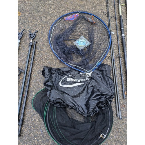 76 - A Selection Of Fishing Rods And Nets including Shimano, hyper loop , telescopic handles