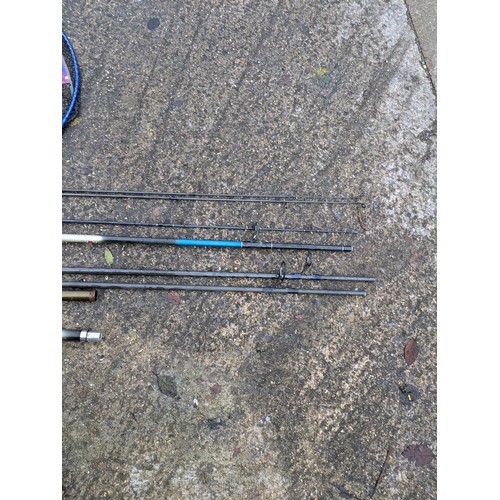 76 - A Selection Of Fishing Rods And Nets including Shimano, hyper loop , telescopic handles