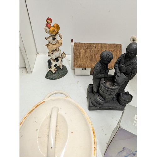 568 - A Selection Of Ceramic Figurines And A Cast Iron Door Stop