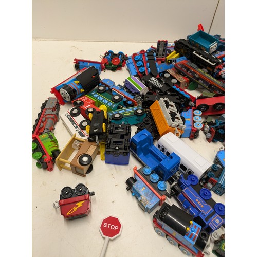 569 - A Selection Of Toy Trains Including Ertl, Mattel And Others