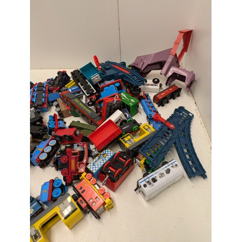 569 - A Selection Of Toy Trains Including Ertl, Mattel And Others