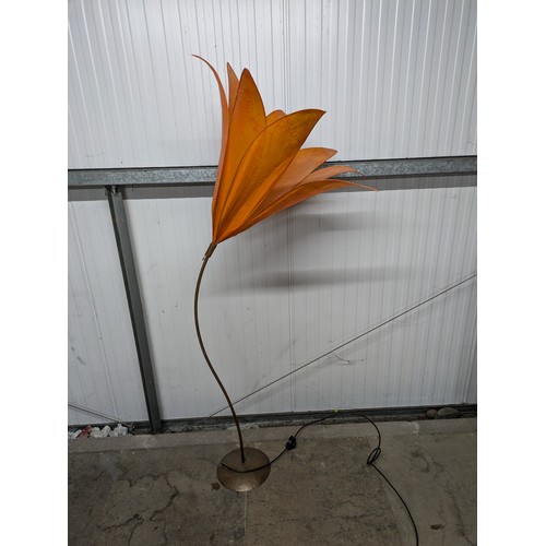 577 - A Floor Standing Flower Shaped Lamp With A Copper Base