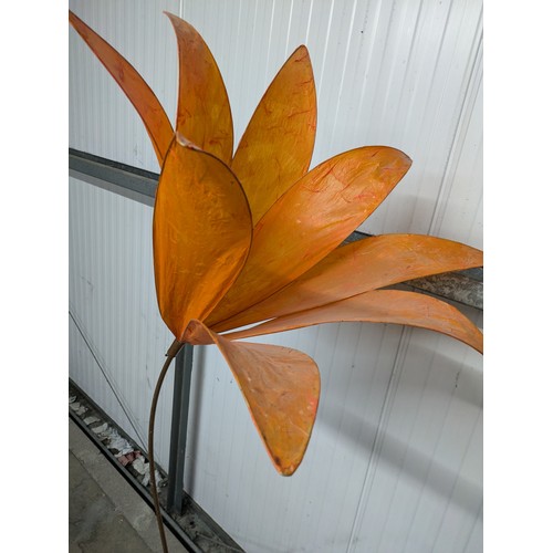 577 - A Floor Standing Flower Shaped Lamp With A Copper Base