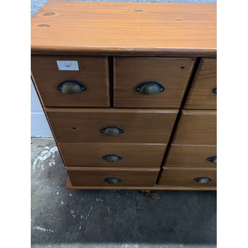 597 - Pine 10 drawer graduated chest of drawers