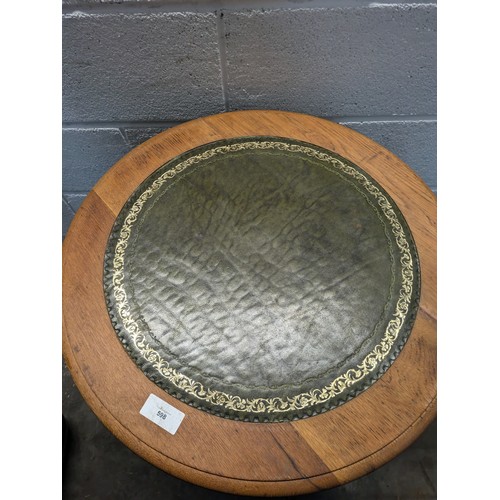 598 - Circular pine table with leather top