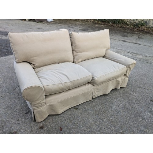 113 - A Cream 3 Seater Sofa With Covers