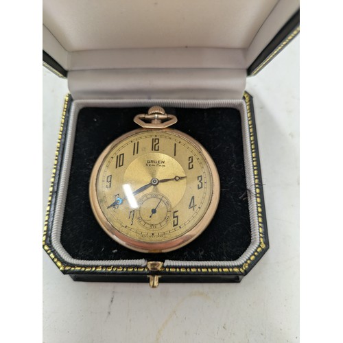 449 - A Late Victorian Gruen Gold Plated Pocket Watch In A Black Protective Case