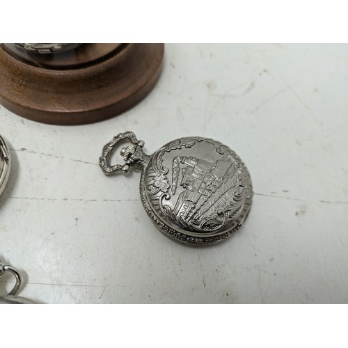 448 - A Selection of 4 Modern Silver coloured Pocket Watches