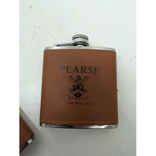 1062 - A Pair of Leather Covered Please Hip Flasks