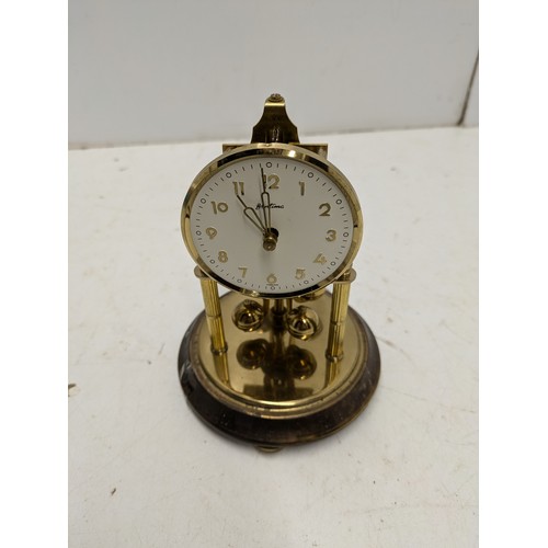 455 - A Bentima Brass Anniversary Clock With White Dial and Glass Dome