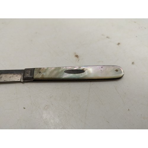 465 - A Sterling Silver Pocket Knife with a Mother of Pearl Style Handle