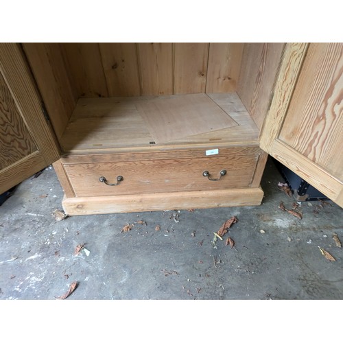 235 - A Pitch Pine Wardrobe With Single Drawer To the Base