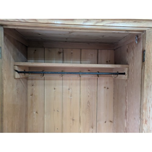 235 - A Pitch Pine Wardrobe With Single Drawer To the Base