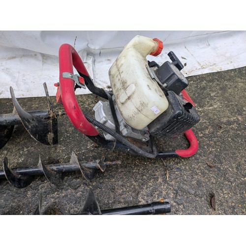 10 - An Earth Auger GR35 petrol Auger With Attachments