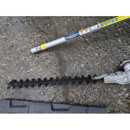 11 - A Hyundai Petrol Strimmer with addition Hedge trimmer attachment