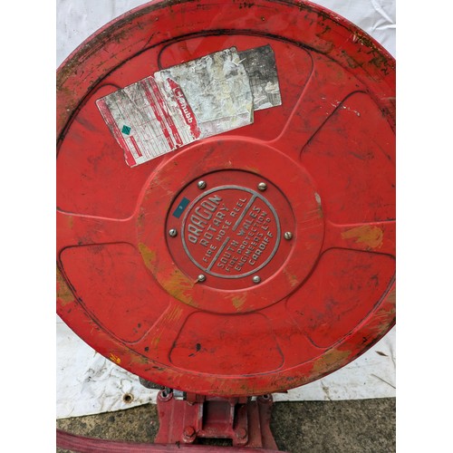 76 - A Vintage Fire Hose on Retractable Reel