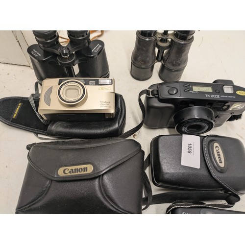 1058 - A Selection Of Retro Digital Cameras, and 2 pairs of Binoculars