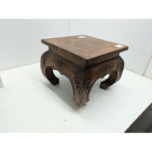 205 - A Walnut Oriental Floral Engraved Vase stand