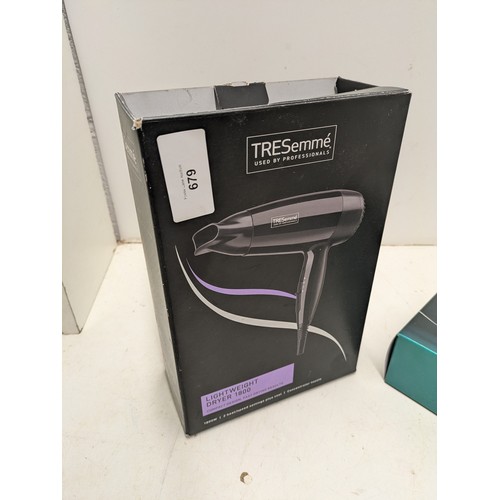 679 - A Treseme Hairdryer and a Boots Slim Brush - both boxed