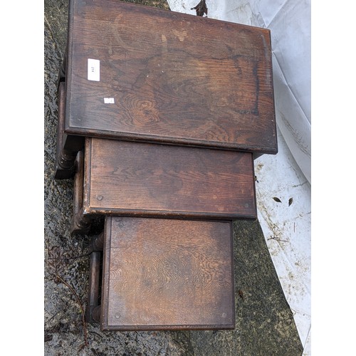 214 - An antique Oak Nest of 3 tables With Wood Engravings