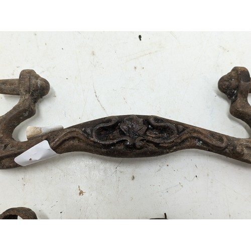 408 - An antique Wrought Iron Door Knocker And Letter Box With Ornate Detailing