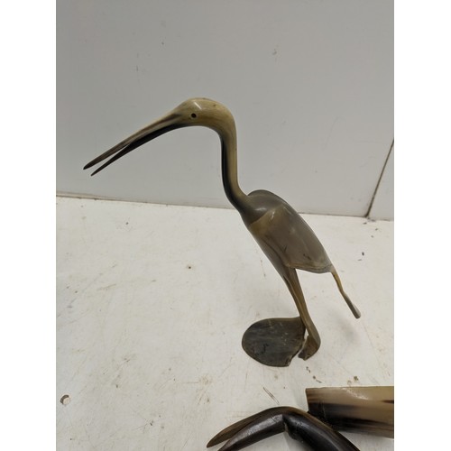 1068 - A vintage Horn Ornament and a pair of Resin Bone Style Cranes