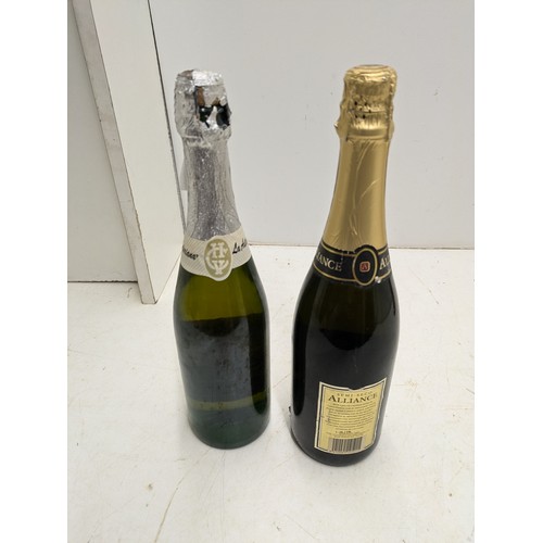 1017 - A pair of Brut Champagnes - one Alliance Semi Seco and a sidra Extra Asturiana