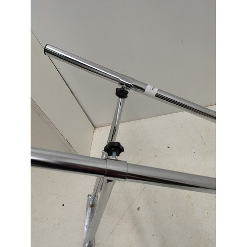 1091 - A Chrome Metal wall Mounted Clothes Rack