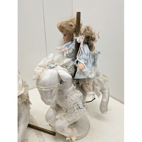 1077 - A Pair of Dolls Riding Horses By the Leonardo Collection