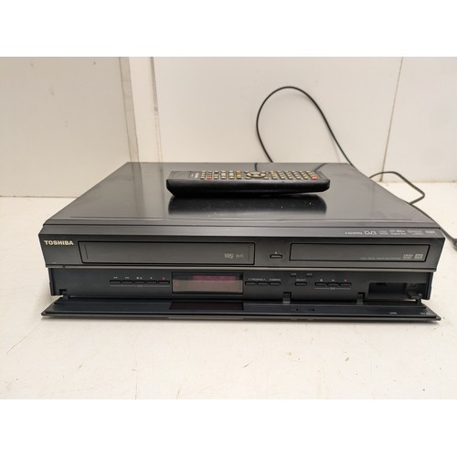 740 - A Toshiba Model DVR20 DVD/VCR Player And Recorder With Remote