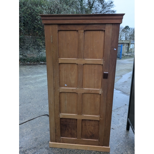 248 - A vintage Pine Verniered Traditional Style Carved Cupboard/Wardrobe (door missing screws)