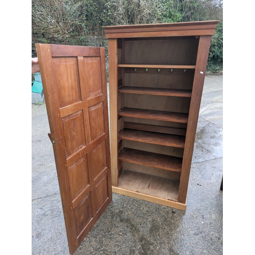 248 - A vintage Pine Verniered Traditional Style Carved Cupboard/Wardrobe (door missing screws)