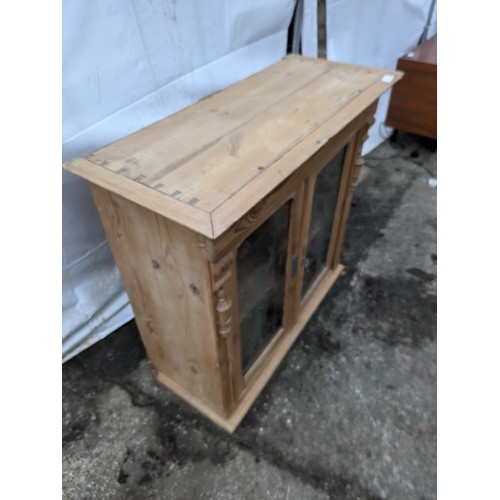 250 - A Modern Pine Cupboard With Glass Engraved Doors And Interior Shelves