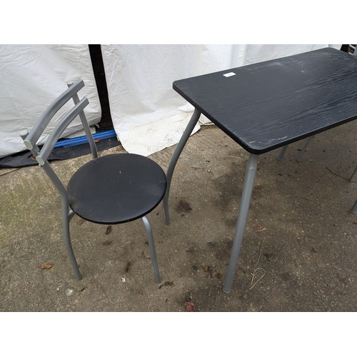 273 - a modern lightweight black topped table with 2 matching chairs