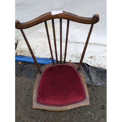 280 - an antique children's chair with an upholstered base