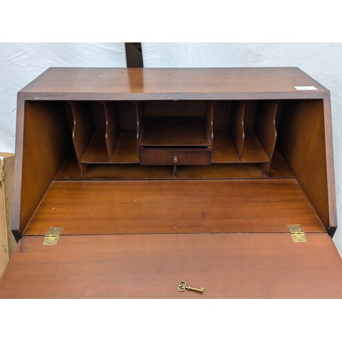 285 - an antique inspired verniered oak bureau